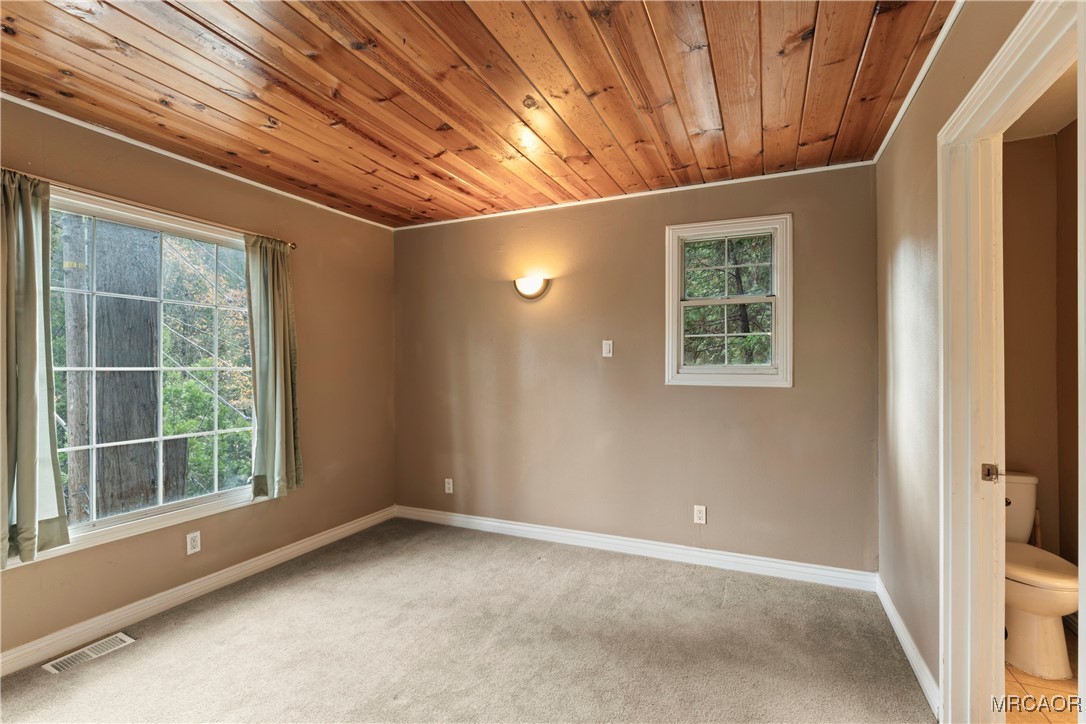 26791 Highway 189 Twin Peaks, CA 92391 - Photo 10 of 39 a view of an empty room with a window