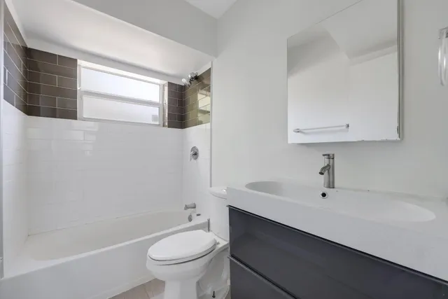 a view of storage and utility room with washer and dryer