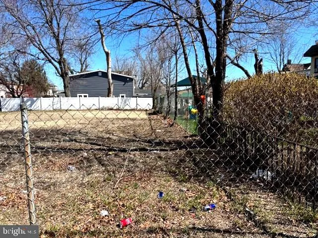 a view of a yard covered with snow