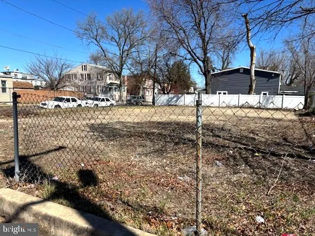 a view of a yard covered with snow