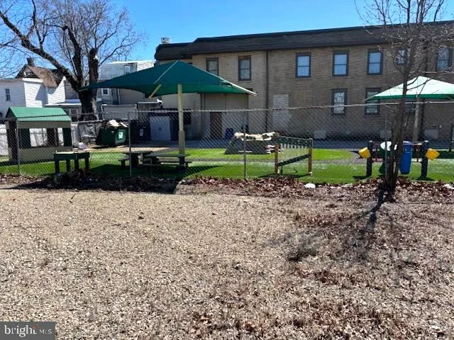 a view of a yard in front of a house