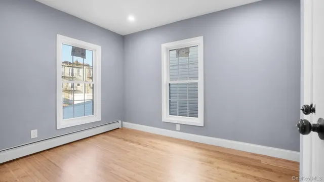 an empty room with windows