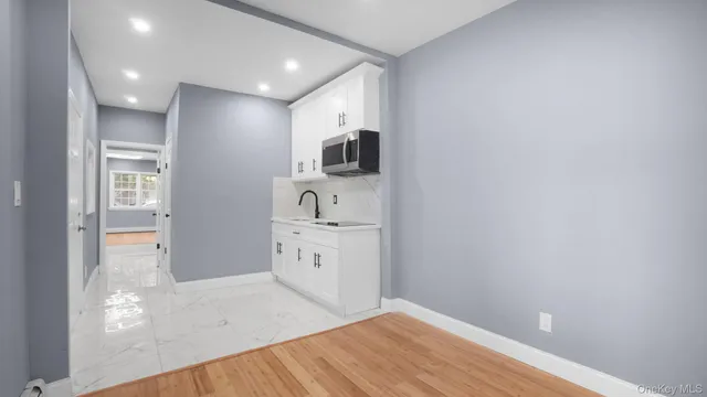 a view of kitchen with wooden floor