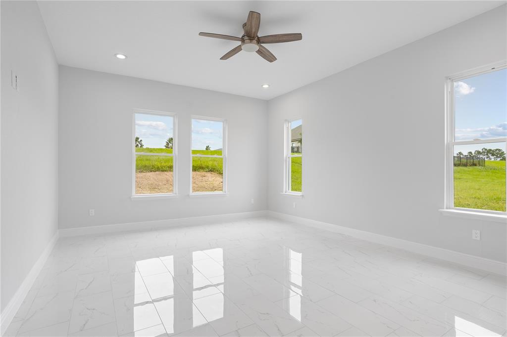 197 Valencia Ridge Drive Auburndale, FL 33823 - Photo 11 of 19 a view of an empty room with a window