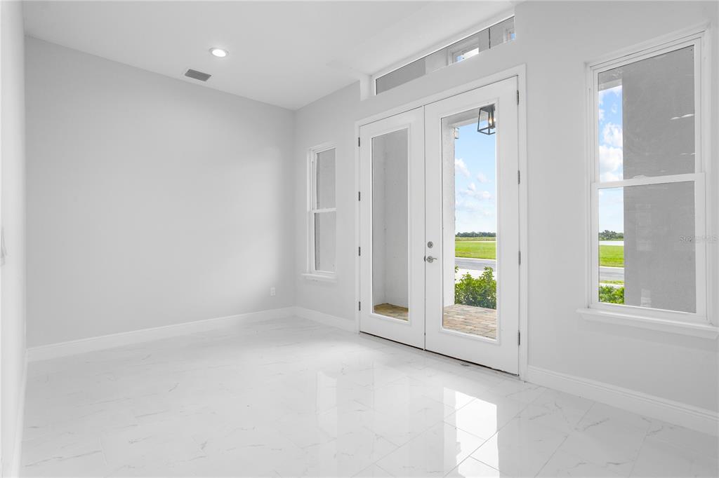 197 Valencia Ridge Drive Auburndale, FL 33823 - Photo 3 of 19 an empty room with windows