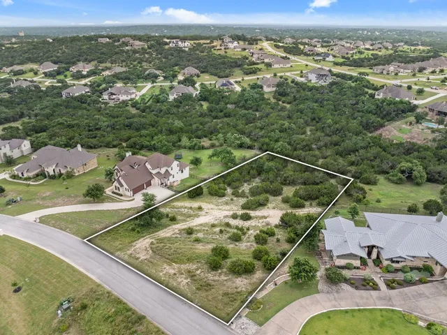 a view of a pool with a yard