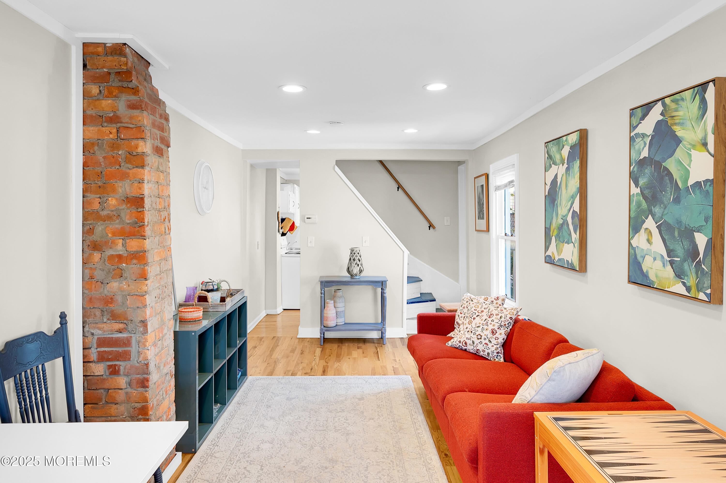 147 Webb Avenue Ocean Grove, NJ 07756 - Photo 12 of 34 a living room with furniture and a flat screen tv