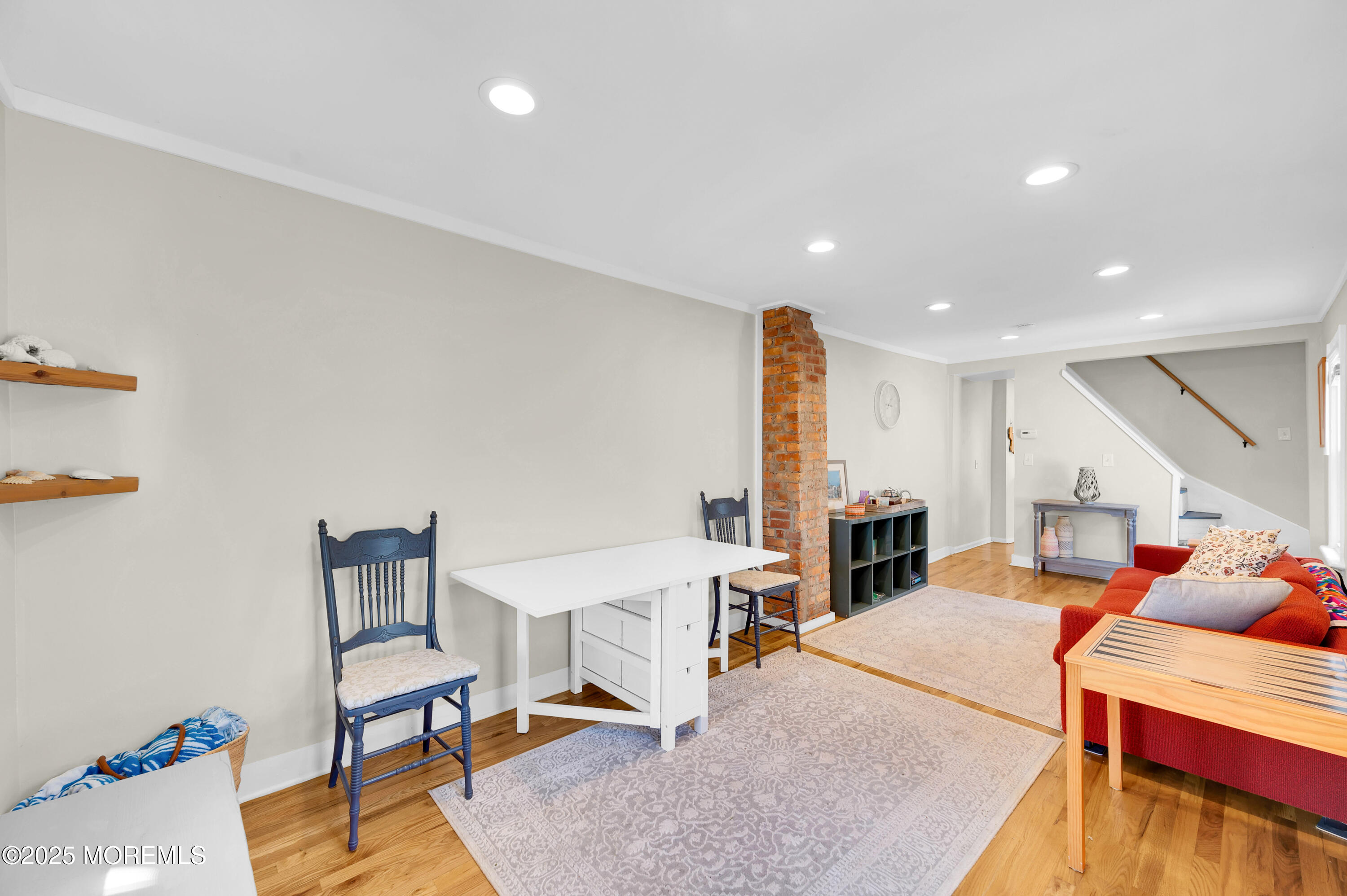 147 Webb Avenue Ocean Grove, NJ 07756 - Photo 13 of 34 a living room with furniture and wooden floor