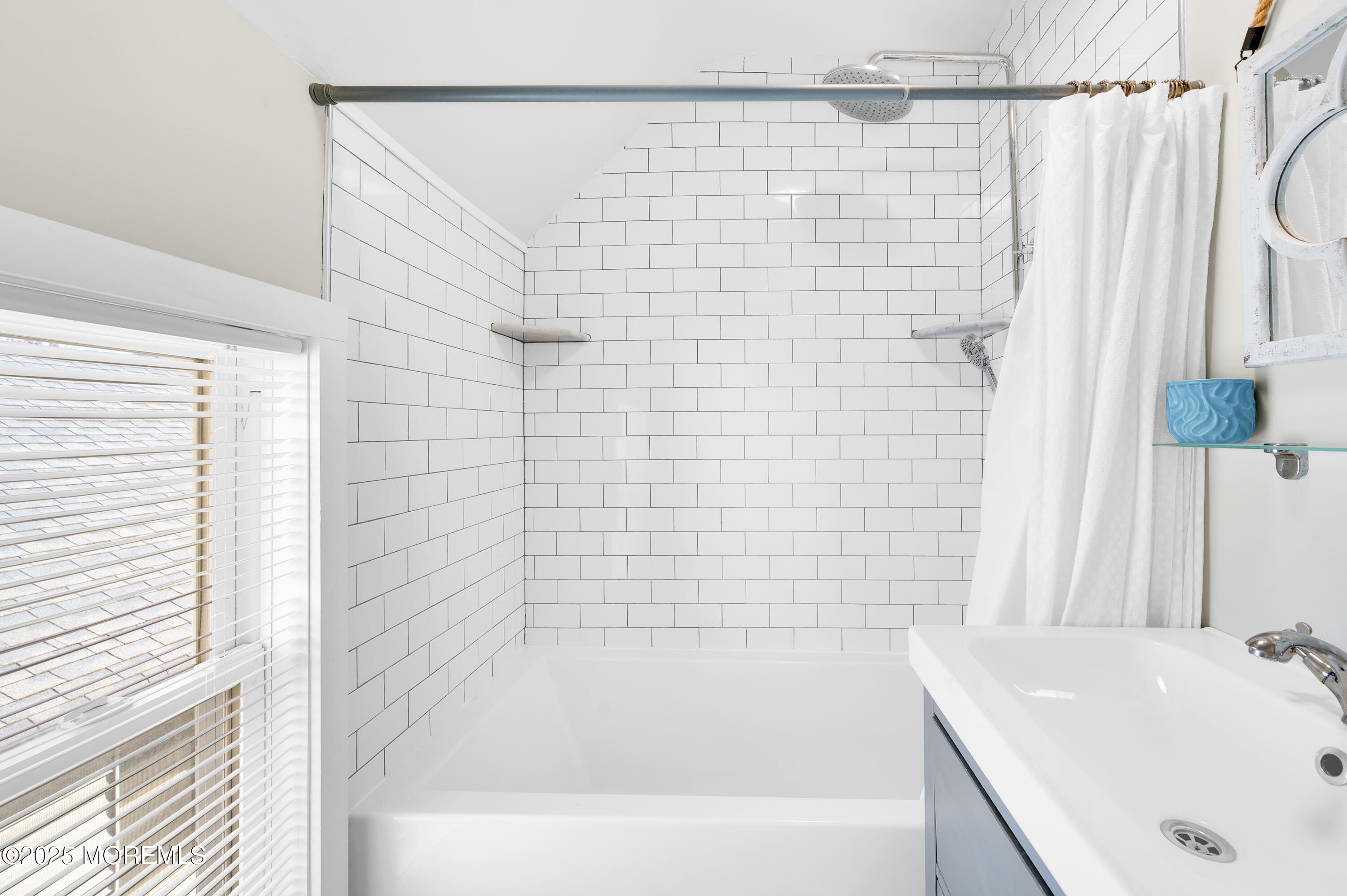 147 Webb Avenue Ocean Grove, NJ 07756 - Photo 23 of 34 a bathroom with a shower and a sink