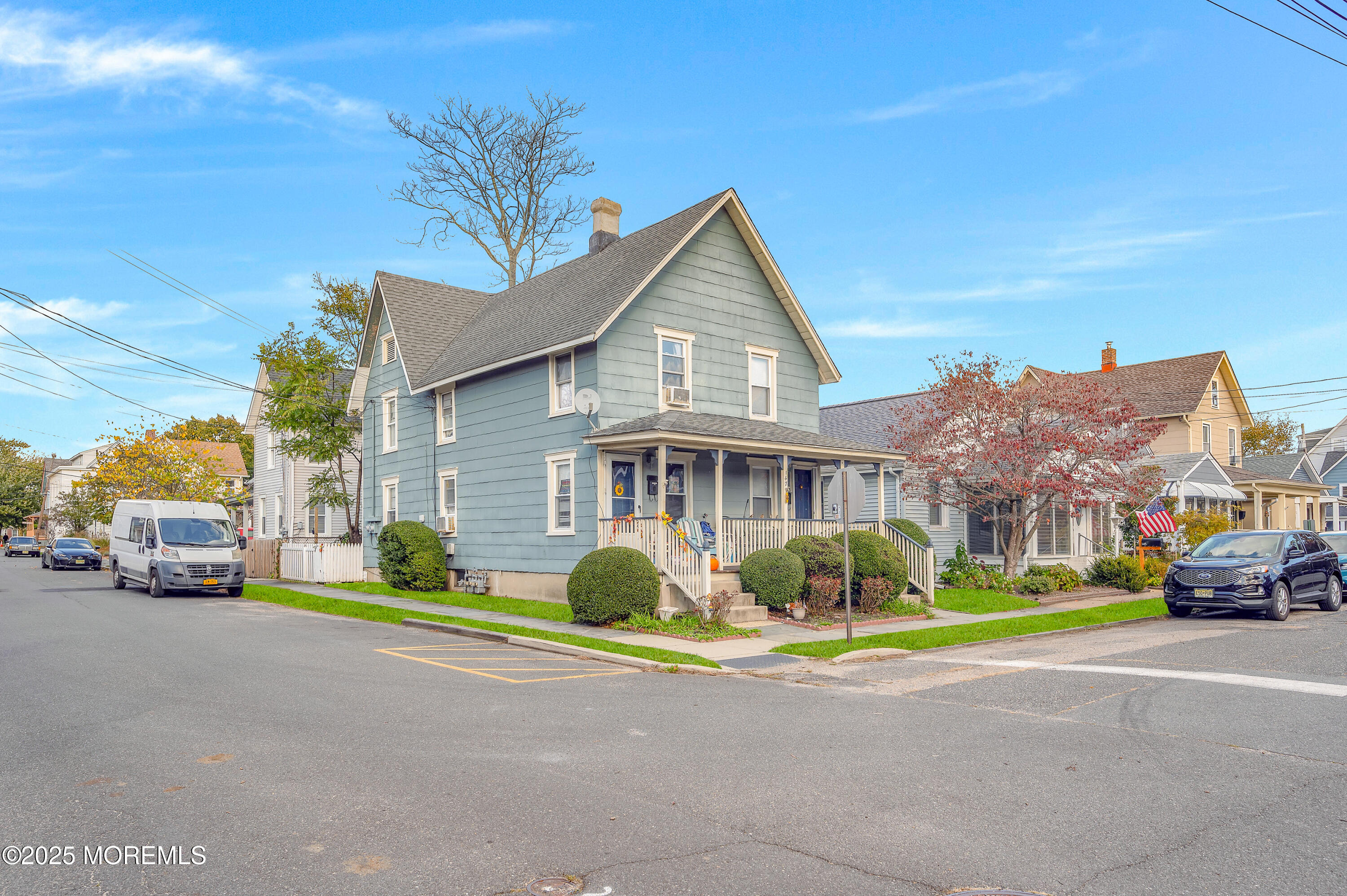 147 Webb Avenue Ocean Grove, NJ 07756 - Photo 3 of 34 a front view of a house with a garden and parking