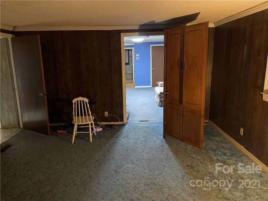 2808 Old Williams Road Raleigh, NC 27610 - Photo 11 of 16 a view of a elevator with wooden door