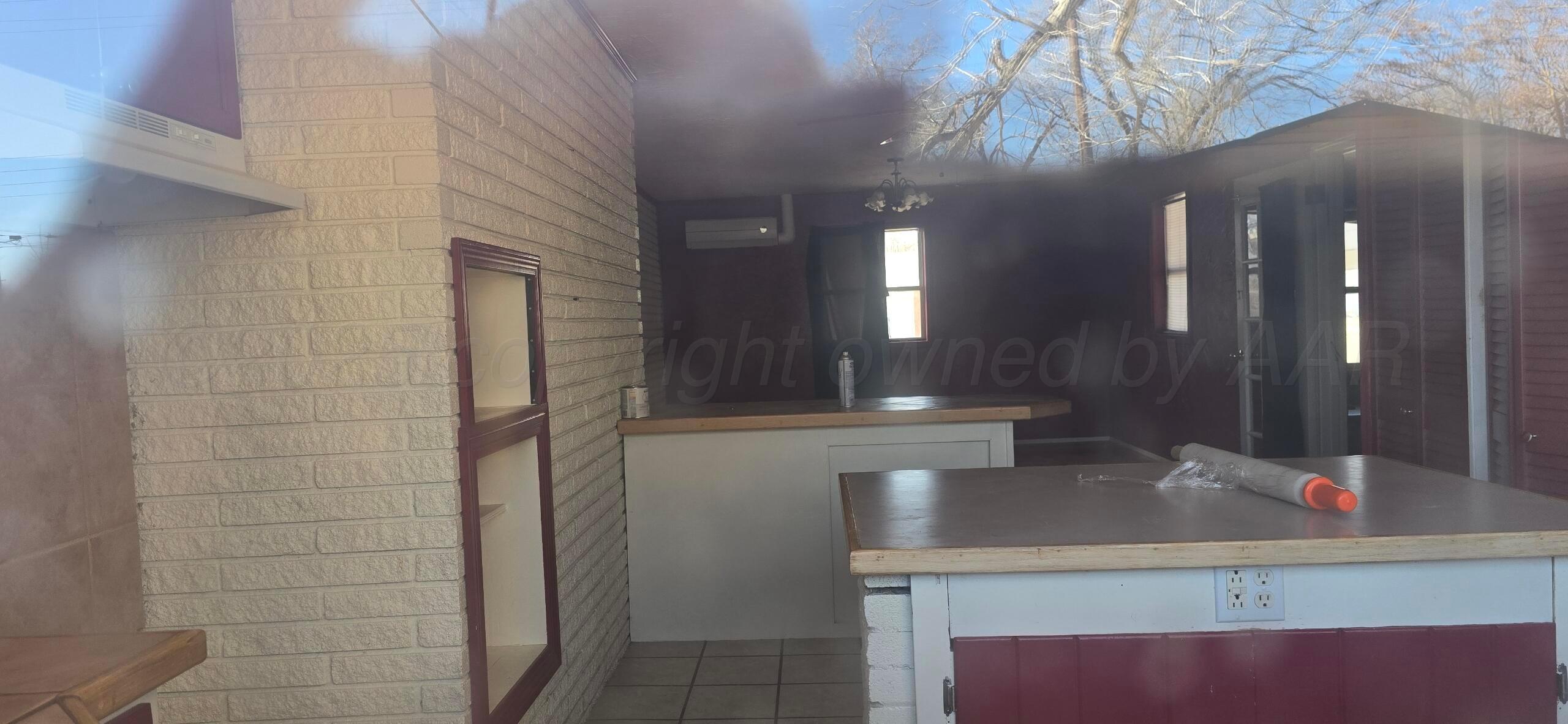 1307 Elm Avenue Dalhart, TX 79022 - Photo 5 of 5 a bathroom with a sink and a mirror