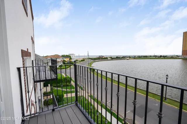 a balcony with wooden floor