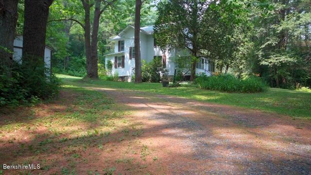 100 Fernside Road Lee, MA 01260 - Photo 15 of 18 a view of a house with backyard and trees