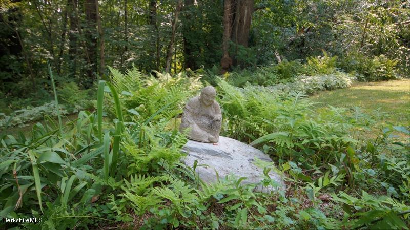 100 Fernside Road Lee, MA 01260 - Photo 17 of 18 a view of a garden with plants and large trees