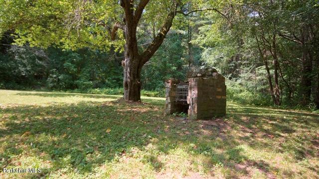 100 Fernside Road Lee, MA 01260 - Photo 18 of 18 a view of a field with trees in the background
