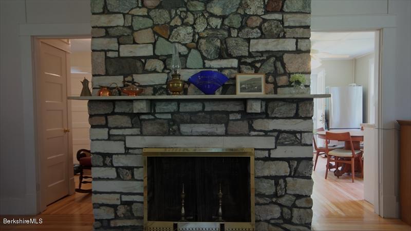 100 Fernside Road Lee, MA 01260 - Photo 9 of 18 a view of a room with racks on the wall