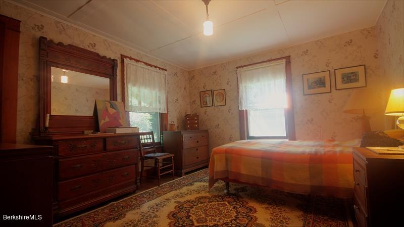 100 Fernside Road Lee, MA 01260 - Photo 10 of 18 a bedroom with a bed and a dresser