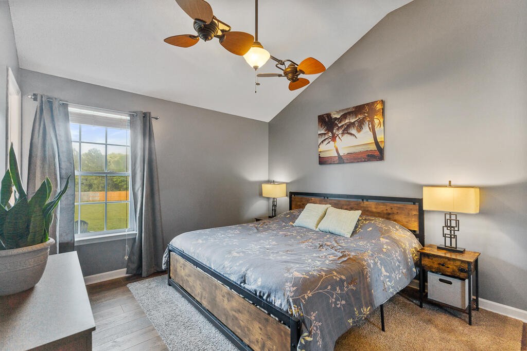 2850 Lower River Road Northwest Georgetown, TN 37336 - Photo 22 of 38 a bedroom with a bed and a painting on the wall