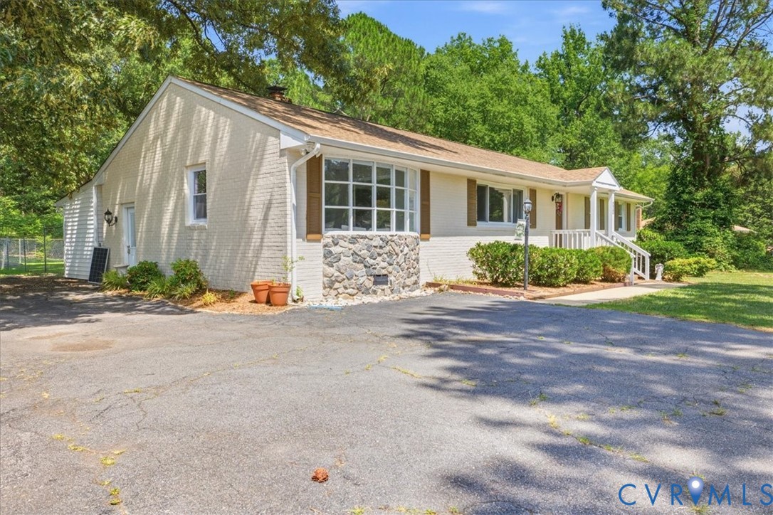 404 Bermuda Hundred Road Chester, VA 23836 - Photo 2 of 37 Single-story residence featuring light-colored bri