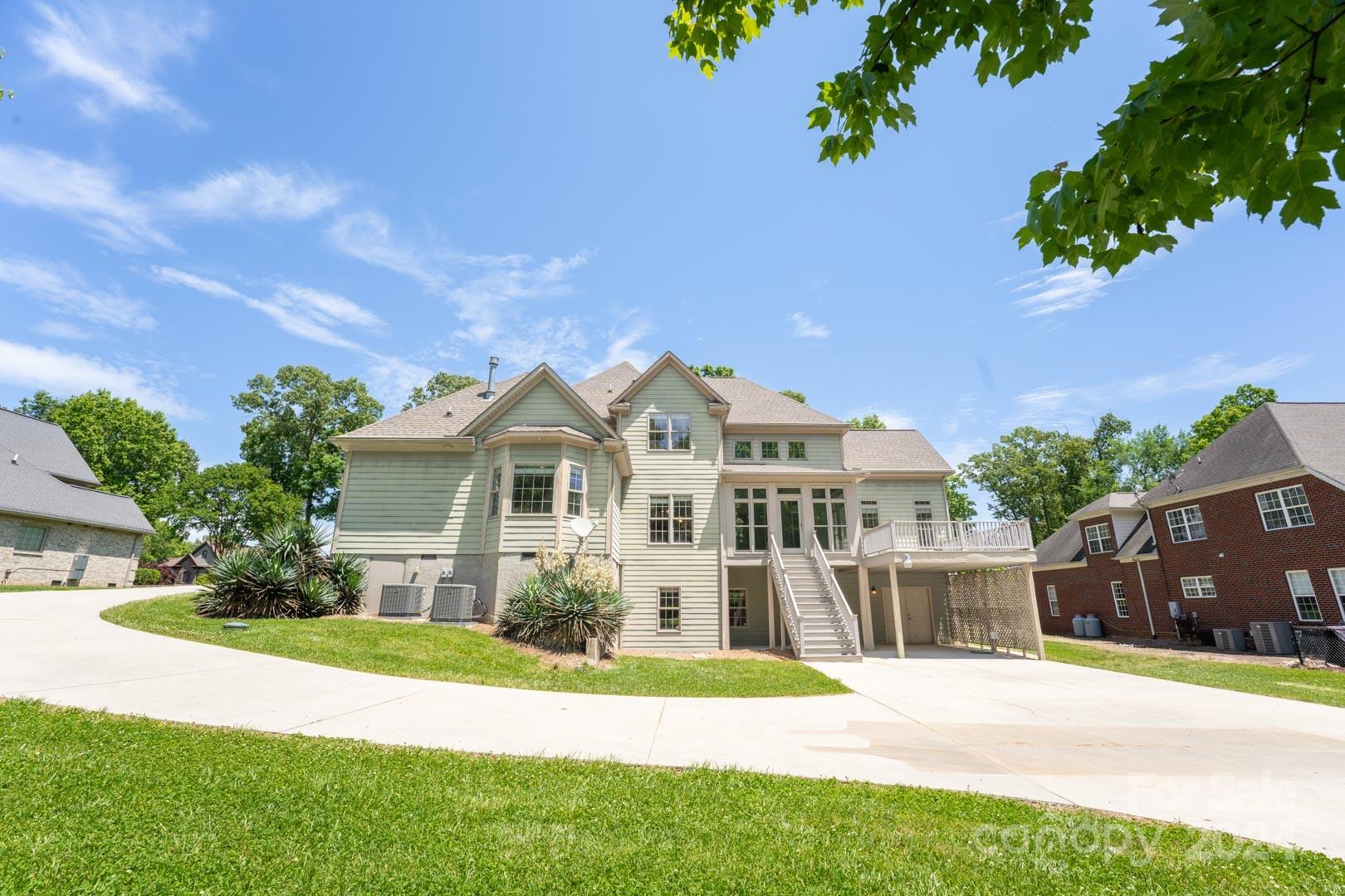 3563 Gordon Street Terrell, NC 28682 - Photo 15 of 45 a front view of a house with a garden