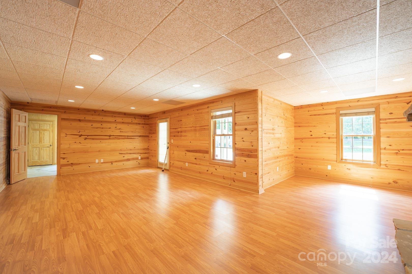 3563 Gordon Street Terrell, NC 28682 - Photo 32 of 45 a view of empty room with wooden floor and fan