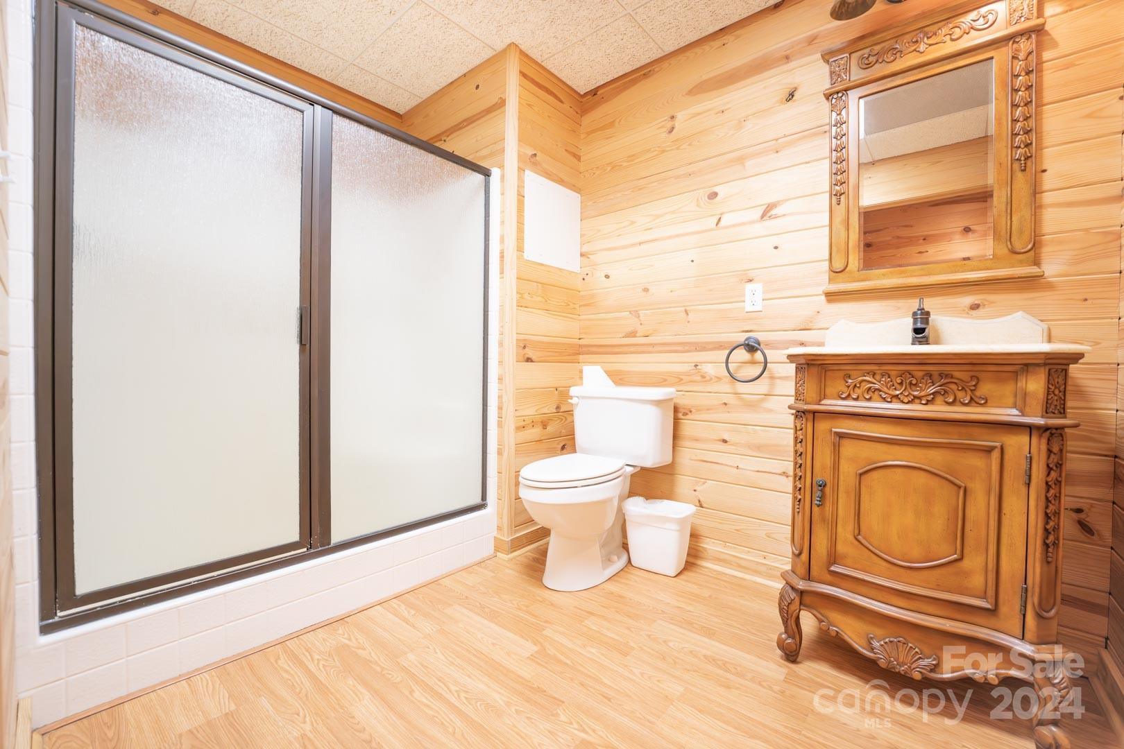 3563 Gordon Street Terrell, NC 28682 - Photo 36 of 45 a bathroom with a toilet a sink and a window