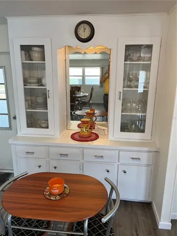 a room with table and chairs