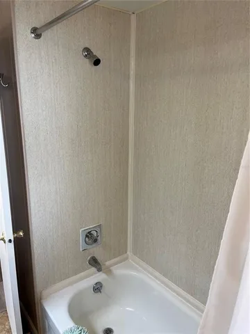 a bathroom with a sink and a tub