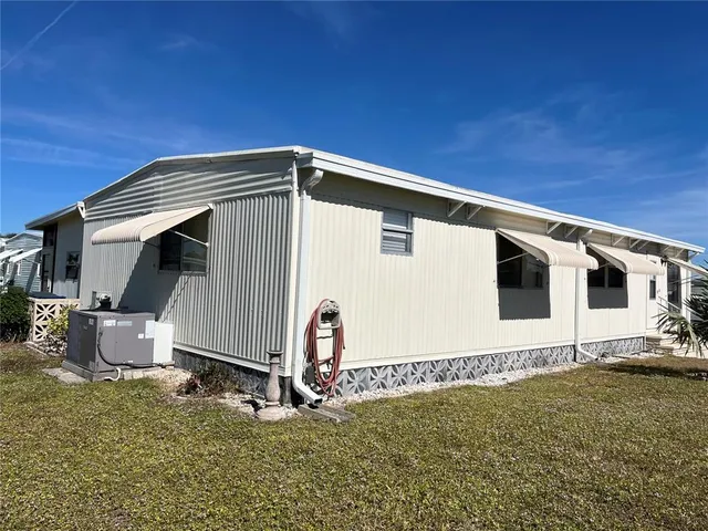 a house with trees in the background
