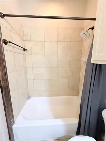 a bathroom with a bathtub