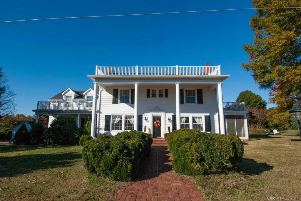 2670 Wilson Road China Grove, NC 28023 - Photo 2 of 24 a front view of a house with garden