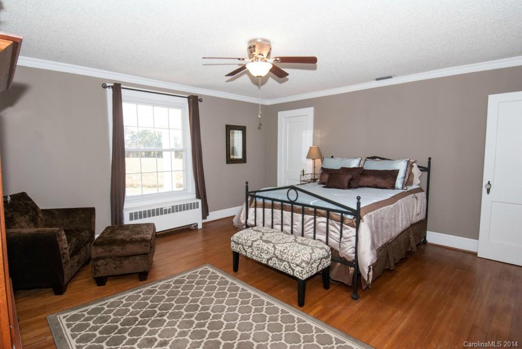 2670 Wilson Road China Grove, NC 28023 - Photo 14 of 24 a bedroom with furniture and a window