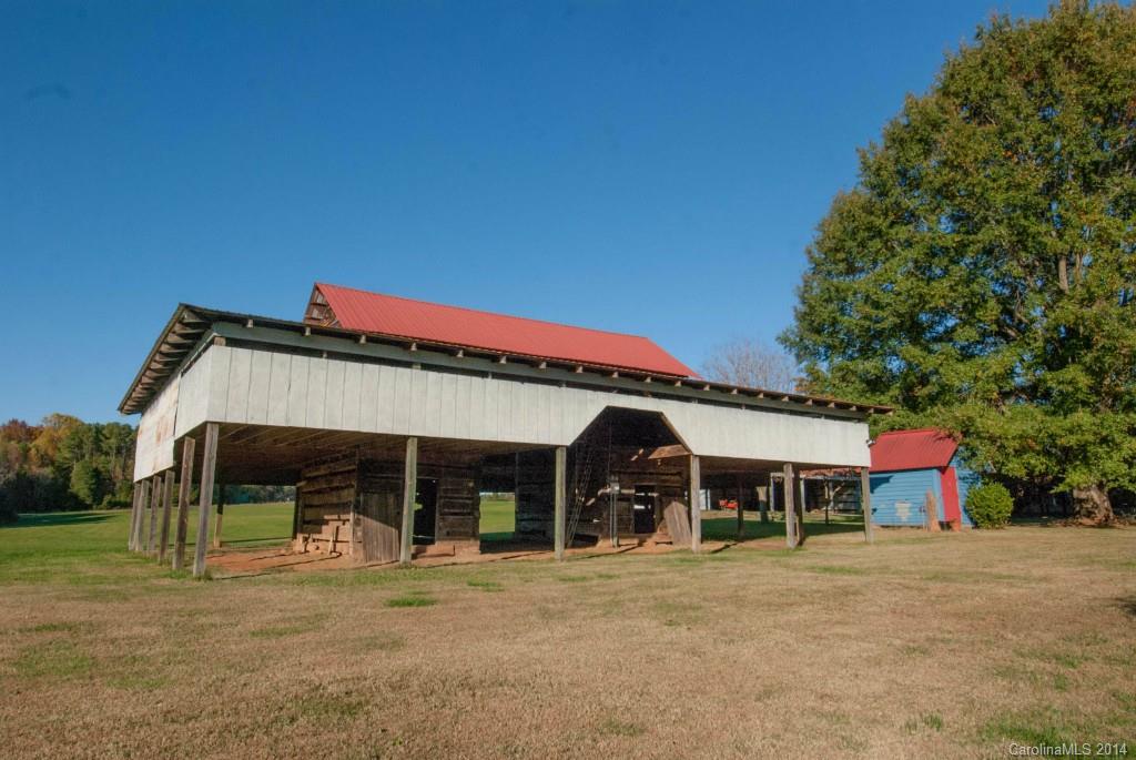 2670 Wilson Road China Grove, NC 28023 - Photo 23 of 24 a front view of a house with garden