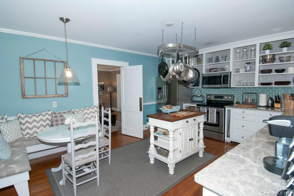 2670 Wilson Road China Grove, NC 28023 - Photo 6 of 24 a kitchen with stainless steel appliances granite countertop a stove and cabinets