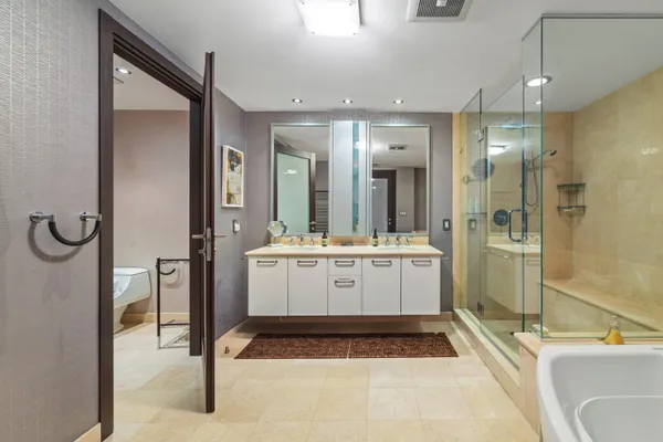 a view of storage and utility room with washer and dryer