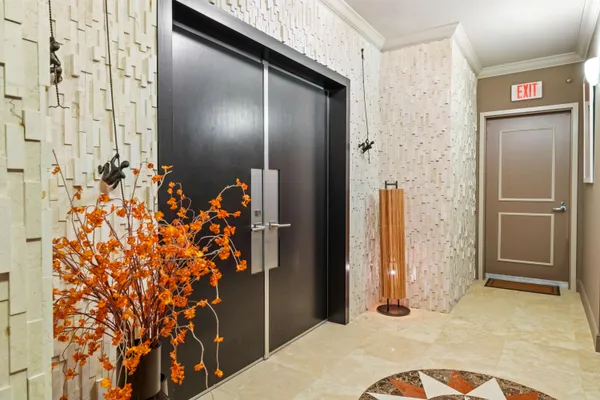 a bathroom with a shower and a mirror