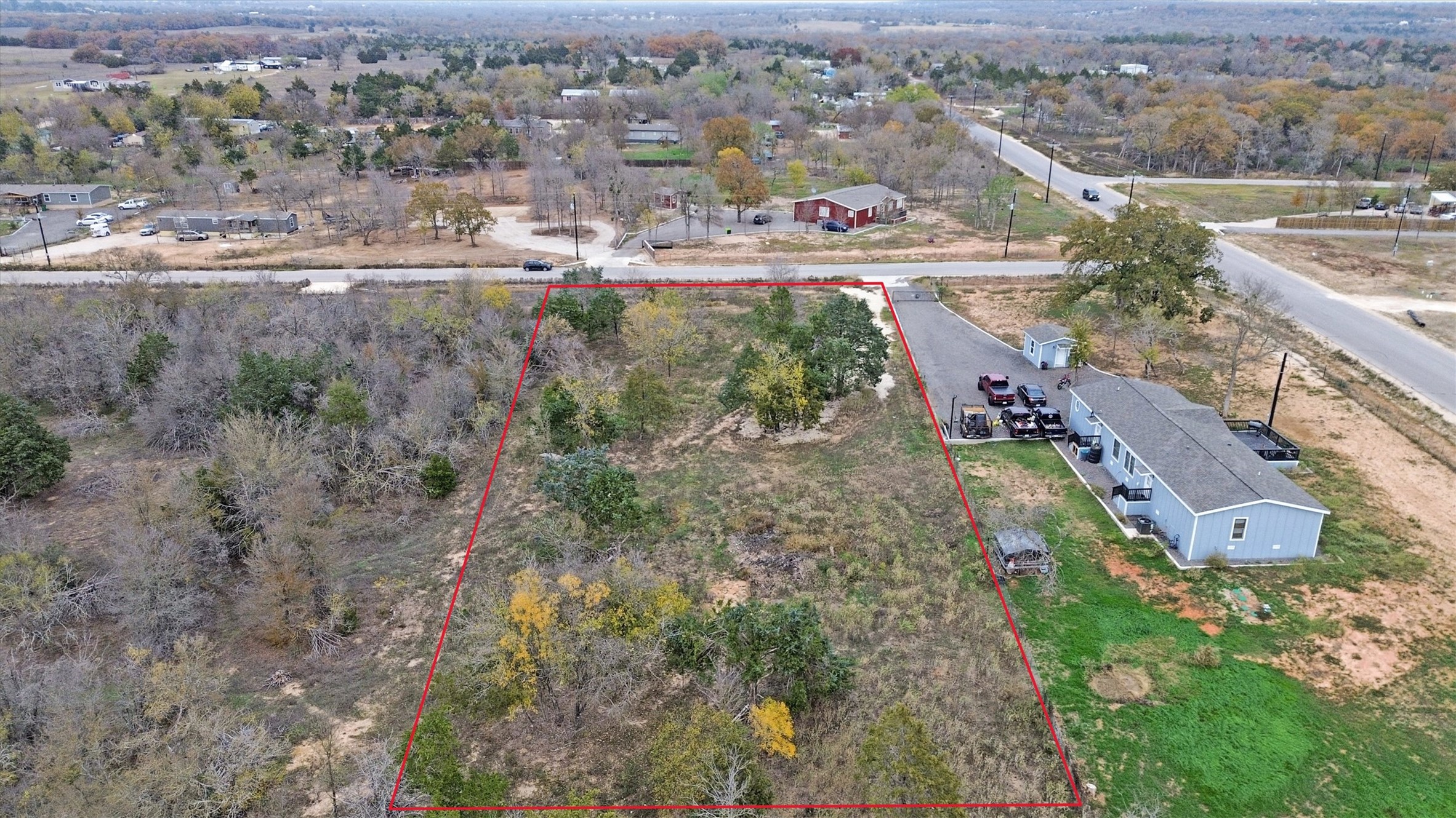 113 Blanco Cyn Street Elgin, TX 78621 - Photo 1 of 5 Aerial view of property's location featuring property boundaries highlighted