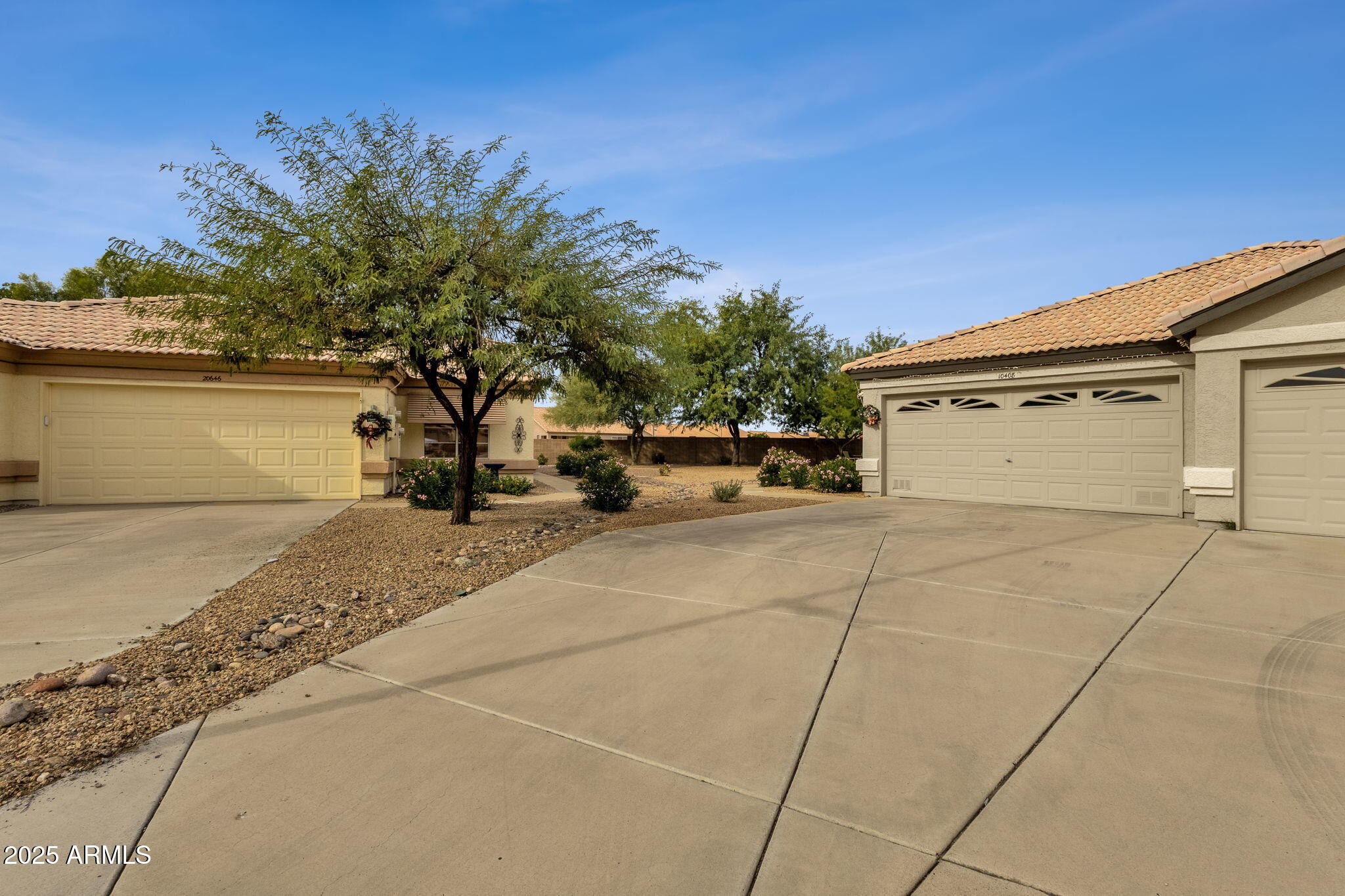 10408 West Burnett Road Peoria, AZ 85382 - Photo 1 of 30 a view of a parking space with a car parked in front of it