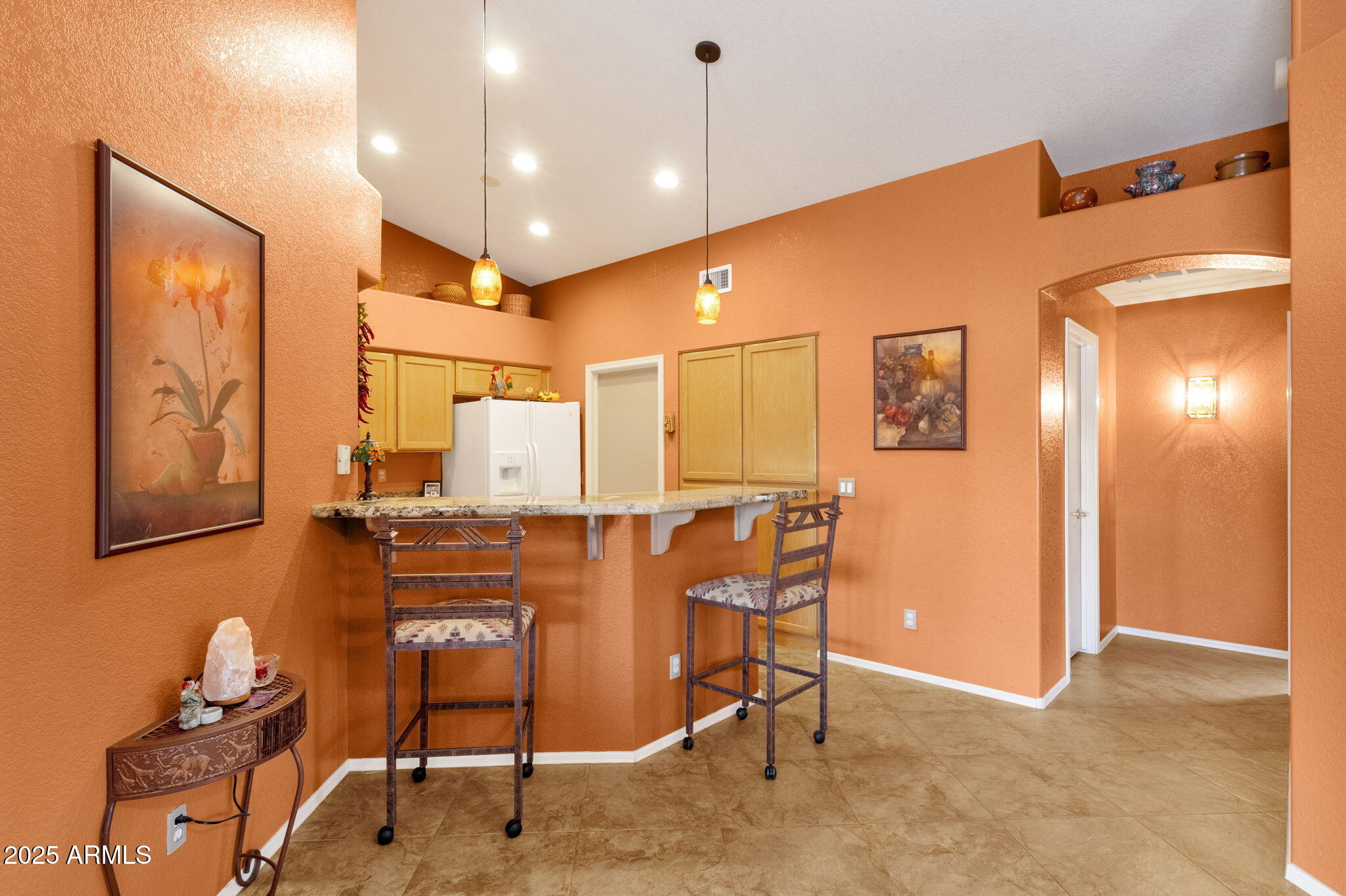 10408 West Burnett Road Peoria, AZ 85382 - Photo 13 of 30 a view of a workspace with furniture