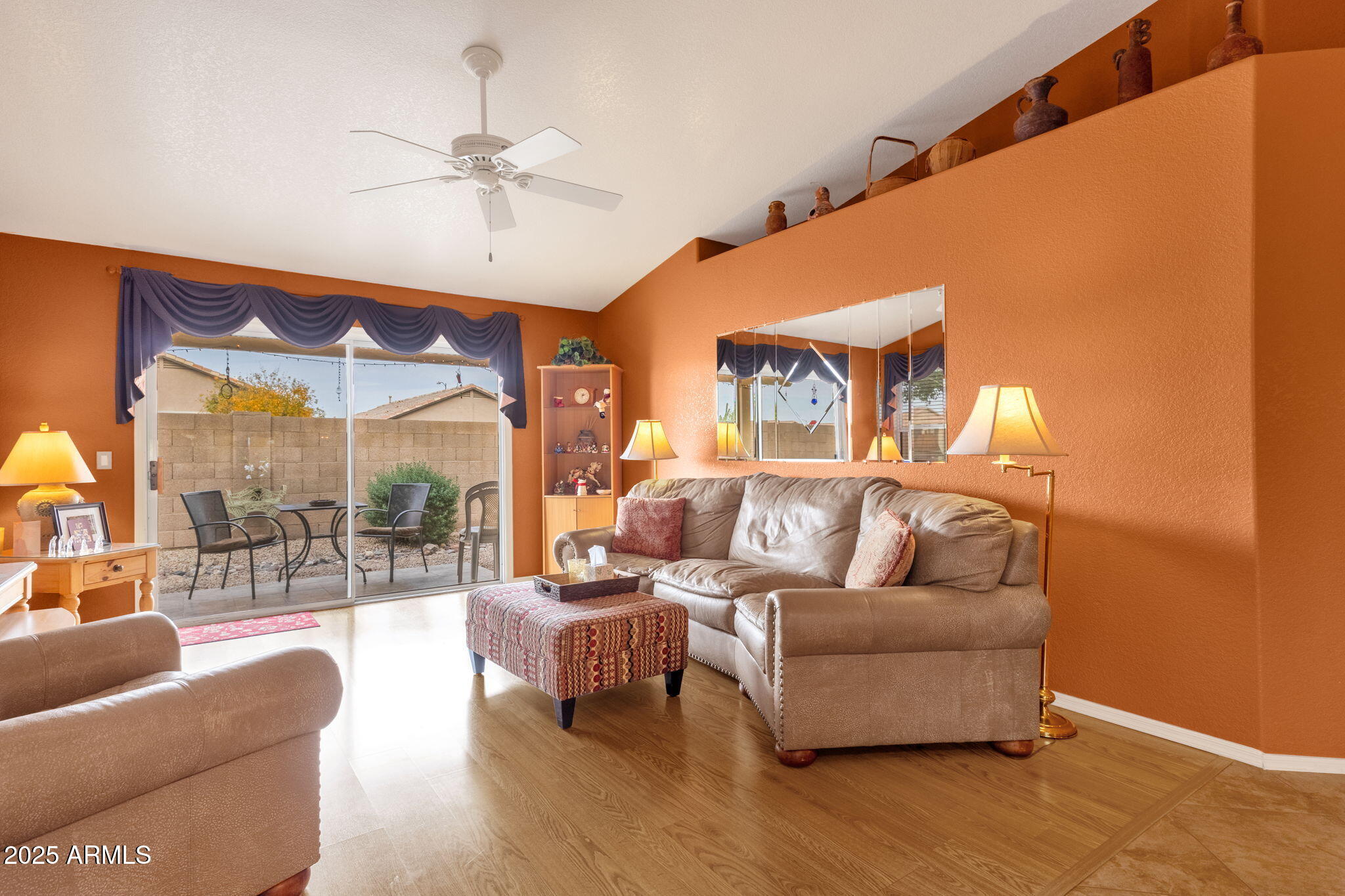 10408 West Burnett Road Peoria, AZ 85382 - Photo 10 of 30 a living room with furniture and a large window