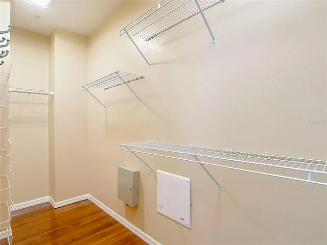a view of a room with racks on the wall
