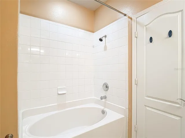 a bathroom with a bathtub