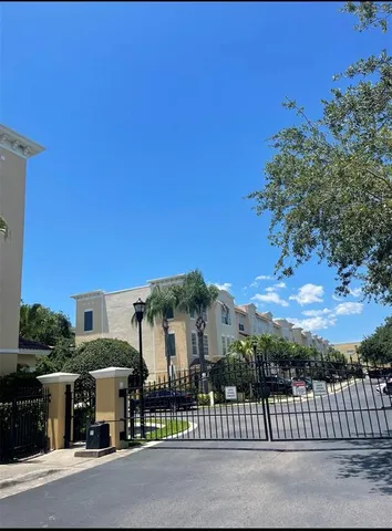 a view of a street in front of a building