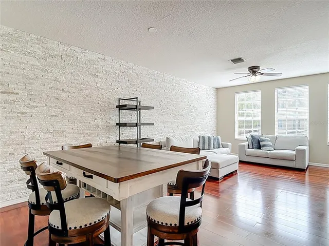 a view of a livingroom with furniture and window
