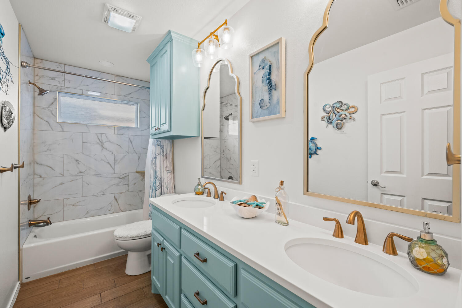 2605 Madison Street Lubbock, TX 79415 - Photo 14 of 23 a bathroom with a tub sink toilet and a mirror