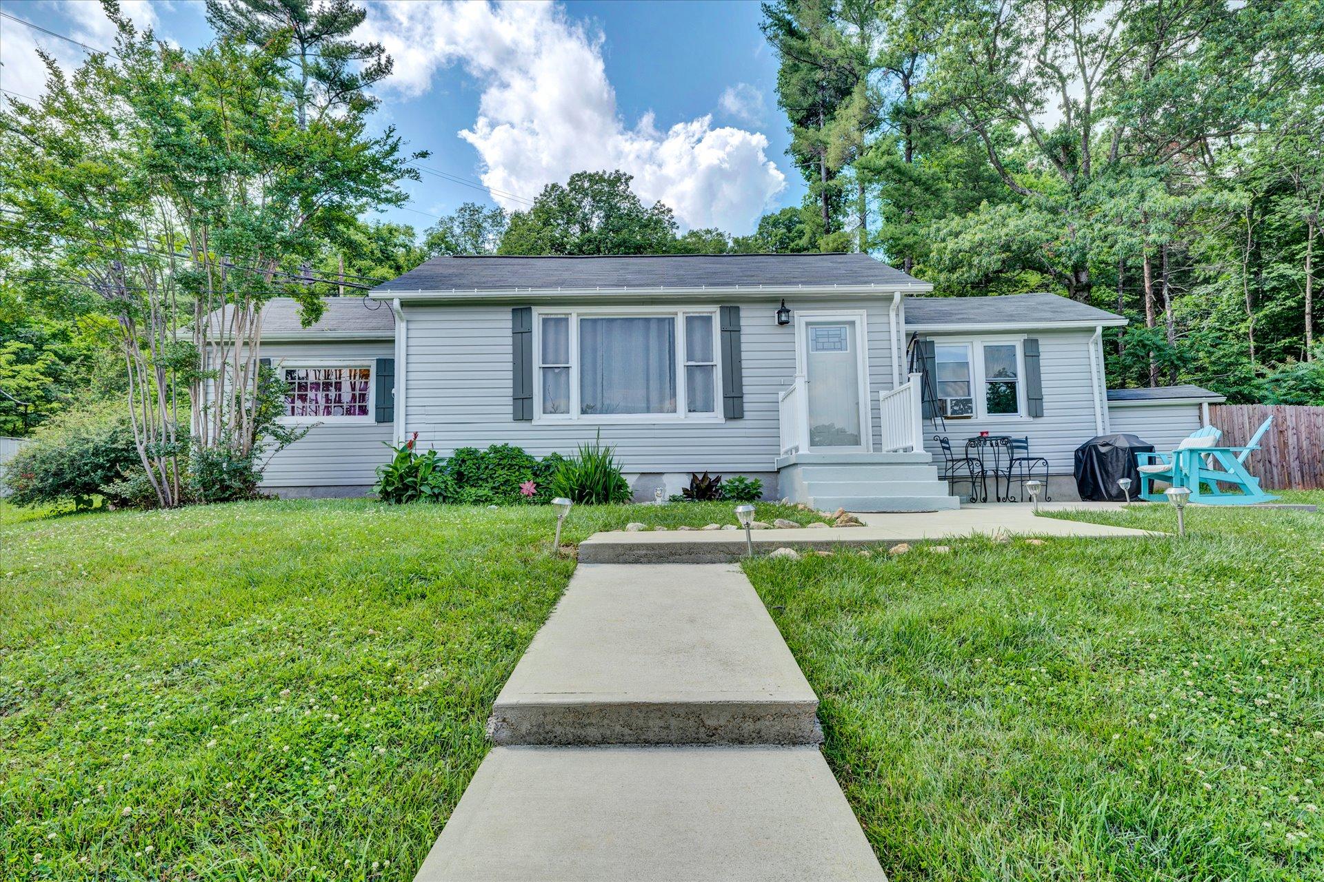 1344 Skyview Road Salem, VA 24153 - Photo 1 of 23 a front view of house with yard and green space