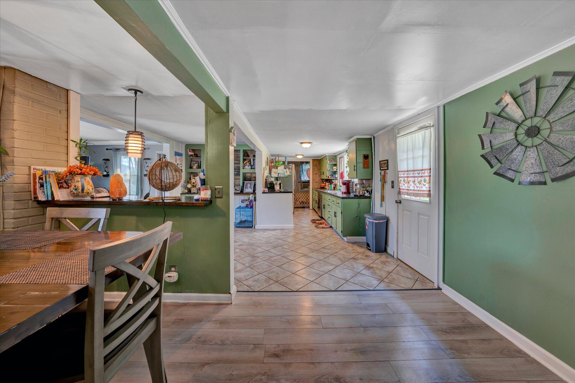 1344 Skyview Road Salem, VA 24153 - Photo 12 of 23 a view of kitchen and dining area with furniture
