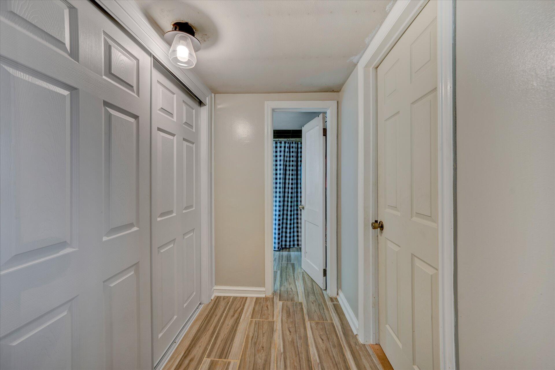 1344 Skyview Road Salem, VA 24153 - Photo 14 of 23 a view of a hallway with wooden floor and entryway
