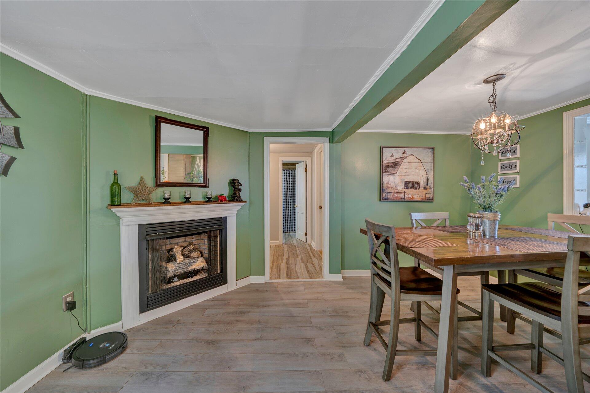 1344 Skyview Road Salem, VA 24153 - Photo 10 of 23 a workspace with furniture and a fireplace